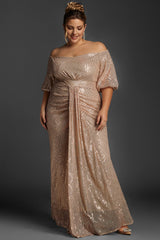 A stylish plus size woman wearing an off-the-shoulder black birthday dress with pleated details, showcasing an elegant look for special occasions
