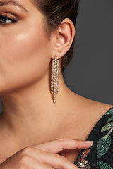 Close-up of elegant square zirconia tassel earrings featuring cascading zirconia stones and a polished gold-tone finish, perfect for any occasion.