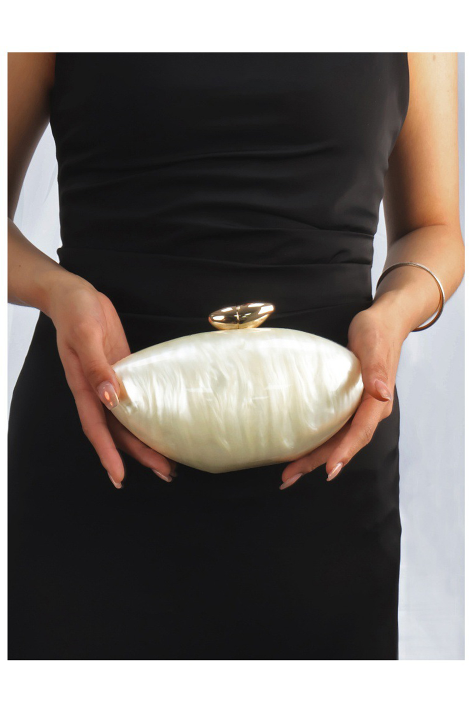 Curveins Trendy Bullet-Shaped Sleek Metallic Finish and Compact Design Evening Bag