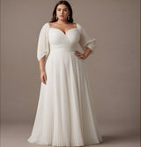 Flattering Plus Size White Dress with Chiffon Details | Curveins